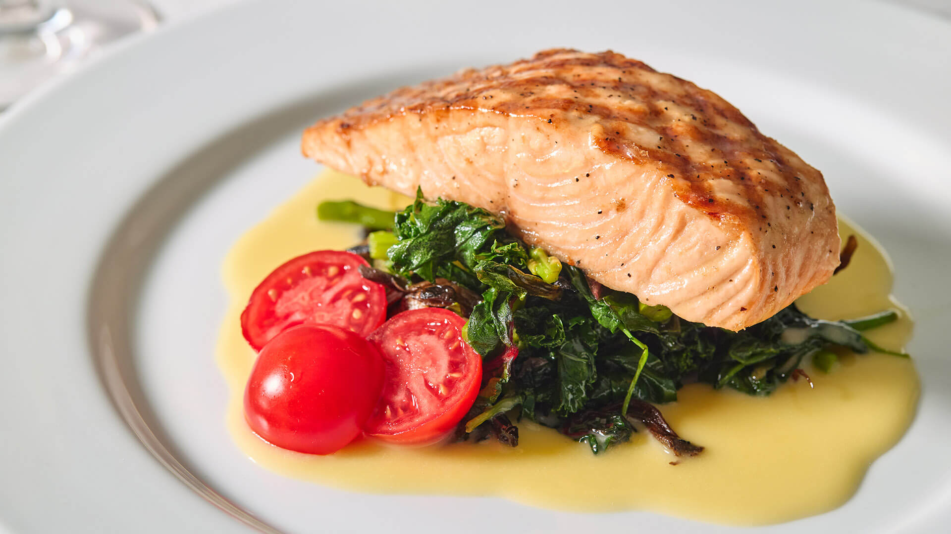Salmon on a bed of greens