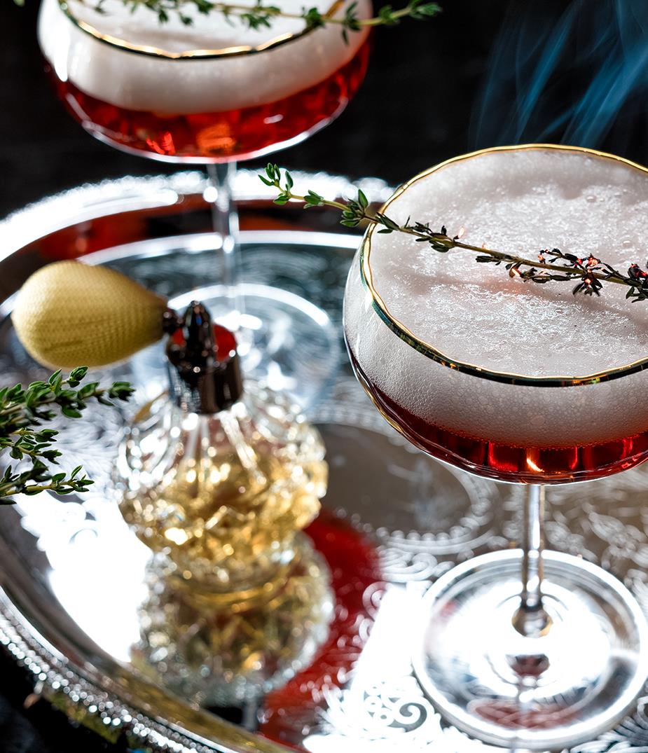 Two exotic cocktails on a silver platter